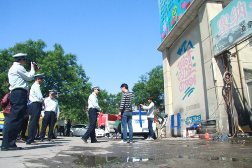 北京城管近期将开展非法洗车业专项整治行动